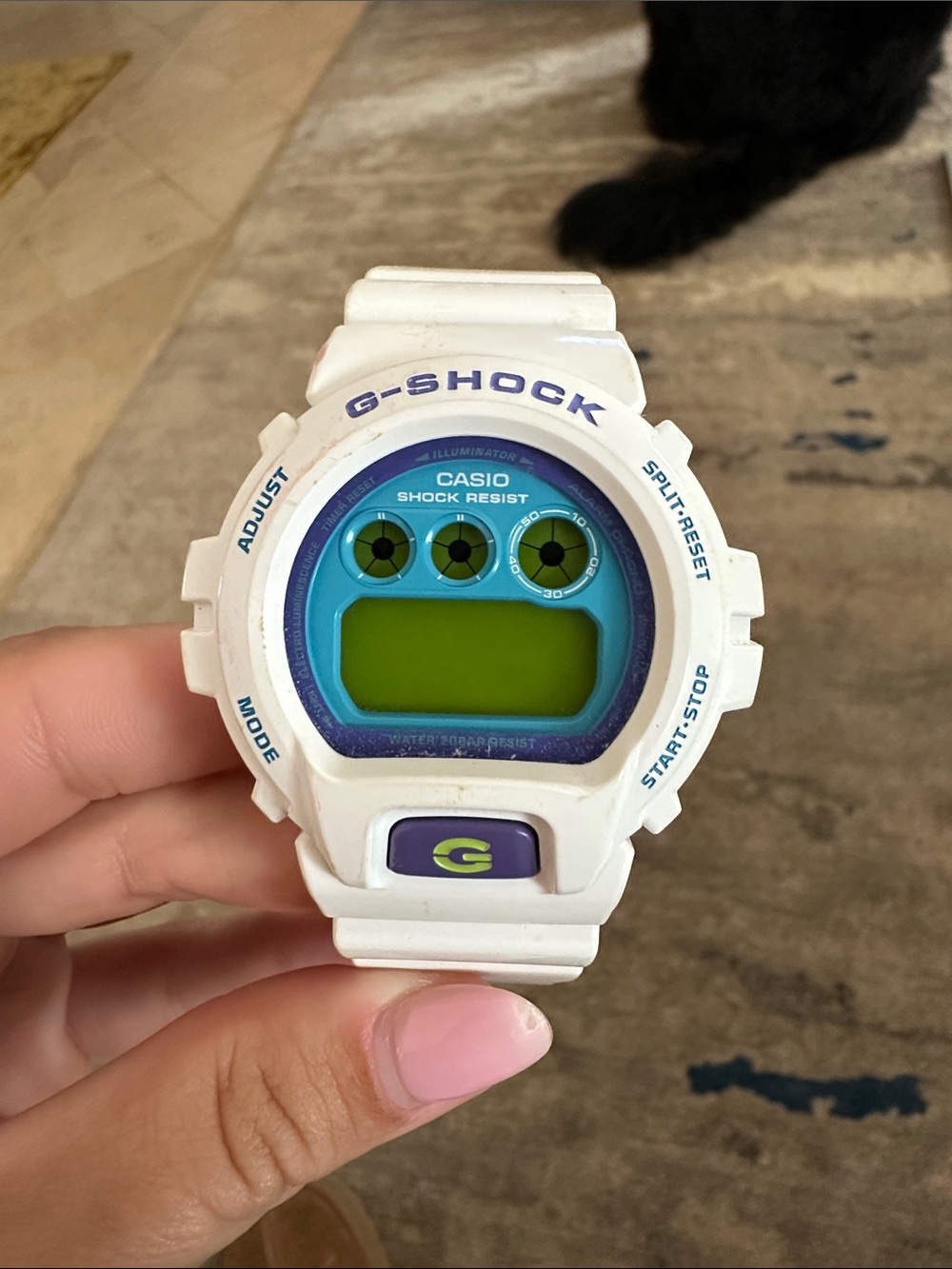 G-Shock White Watch with Blue and Green Accents